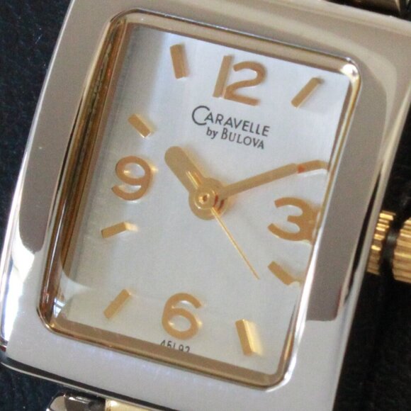 Caravelle Ladies Silver Tone With Gold Accents ½ Bangle Bracelet MOP Dial 16mm
